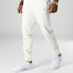 Meilleure affaire 🎉 Pantalon Jogging Essential Embroidery Logo 587187 Beige de Puma 😍