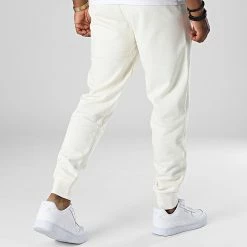 Meilleure affaire 🎉 Pantalon Jogging Essential Embroidery Logo 587187 Beige de Puma 😍 -Puma Soldes 2022 puma 336204 587187 99 20220915T154840 04